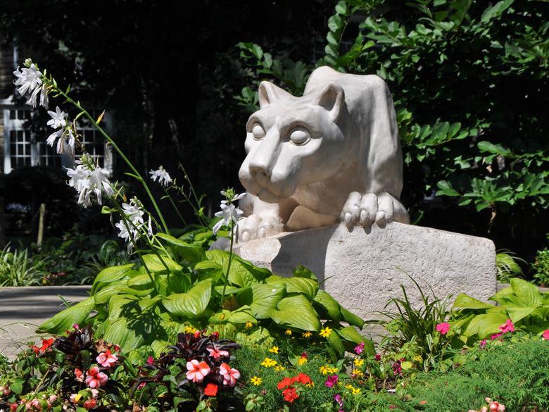 Lion Shrine surrounded by flowers